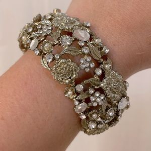 Gold jeweled stretch bracelet.